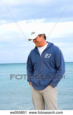 calm, cap, absorbed View Large Photo Image Stock Image - calm, cap, absorbed. Fotosearch