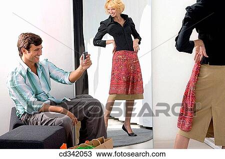 Stock Image - camera, cell phone, changing-room, choice. Fotosearch