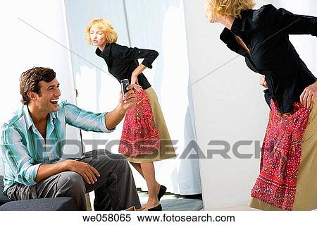 camera, cell phone, changing-room, Clothing store View Large Photo Image Stock Photography - camera, cell phone, changing-room, Clothing store. Fotosearch