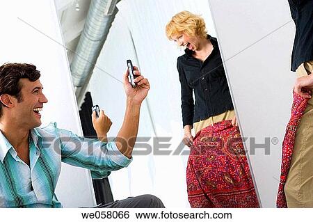 camera, changing-room, cell phone, amusement View Large Photo Image Stock Photograph - camera, changing-room, cell phone, amusement. Fotosearch