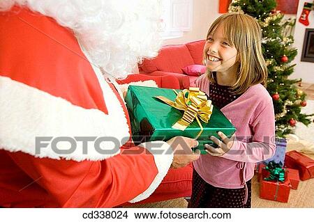 Picture - celebrate, Christmas, child, celebration, at-home. Fotosearch