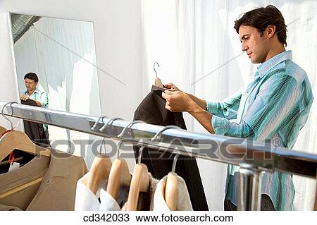 changing-room, choice, choosing, Clothing store View Large Photo Image Stock Image - changing-room, choice, choosing, Clothing store. Fotosearch