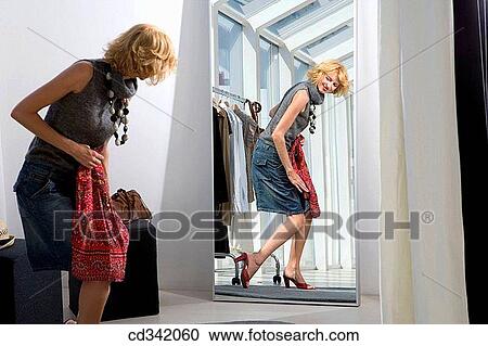 changing-room, choice, choosing, Clothing store View Large Photo Image Stock Image - changing-room, choice, choosing, Clothing store. Fotosearch