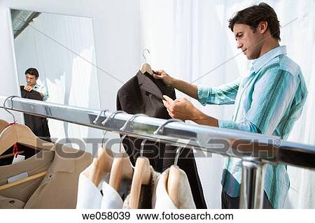 changing-room, choice, choosing, Clothing store View Large Photo Image Stock Photo - changing-room, choice, choosing, Clothing store. Fotosearch