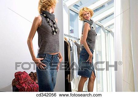 changing-room, choice, choosing, Clothing store View Large Photo Image Stock Photograph - changing-room, choice, choosing, Clothing store. Fotosearch