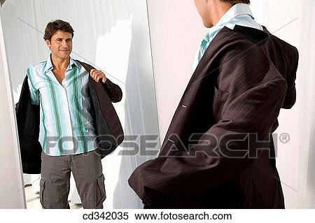 changing-room, choice, choosing, Clothing store View Large Photo Image Stock Photography - changing-room, choice, choosing, Clothing store. Fotosearch