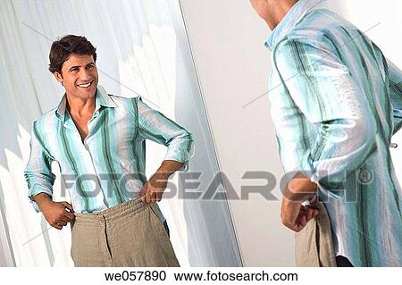 changing-room, Clothing store, contemporary View Large Photo Image Stock Image - changing-room, Clothing store, contemporary. Fotosearch