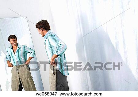 changing-room, Clothing store, contemporary View Large Photo Image Stock Photo - changing-room, Clothing store, contemporary. Fotosearch