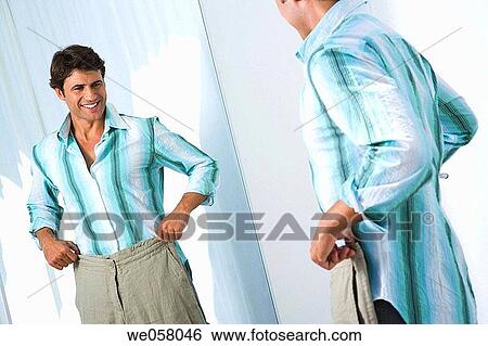 Stock Photograph - changing-room, Clothing store, contemporary. Fotosearch
