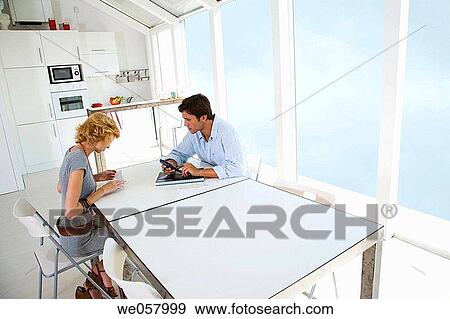 Stock Photo - check, checking, at-home. Fotosearch