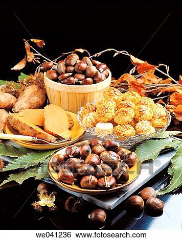 Chestnuts, sweet potatoes and? panellets? little cakes, traditional dessert of the All Saints holiday in Catalonia (Spain) View Large Photo Image Stock Photograph - Chestnuts, sweet potatoes and? panellets? little cakes, traditional dessert of the All Saints holiday in Catalonia (Spain). Fotosearch