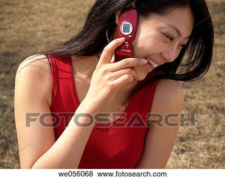chinese girl talking on the phone View Large Photo Image Stock Photo - chinese girl talking on the phone. Fotosearch