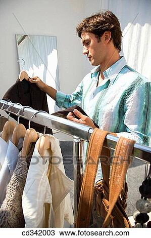 choice, choosing, Clothing store View Large Photo Image Stock Image - choice, choosing, Clothing store. Fotosearch