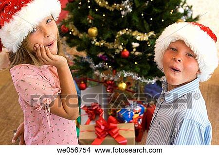 Christmas, boy, childhood, child, brother, at-home View Large Photo Image Picture - Christmas, boy, childhood, child, brother, at-home. Fotosearch