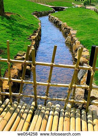 Close up of a small bridge made of bamboos in a Japnese garden Pune, Maharashtra, India View Large Photo Image Stock Photo - Close up of a small bridge made of bamboos in a Japnese garden Pune, Maharashtra, India. Fotosearch