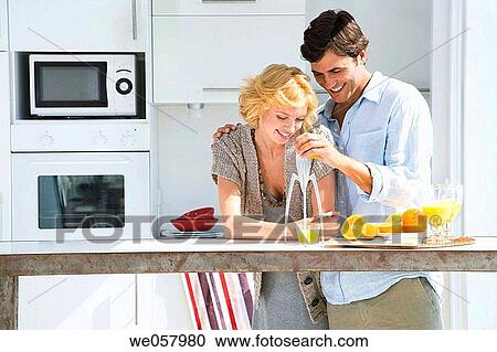 Stock Image - contemporary, couple, at-home. Fotosearch