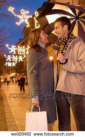 Couple shopping. Christmas decoration. San Sebastißn-Donostia. Guip·zcoa. Euskadi. Spain View Large Photo Image Stock Image - Couple shopping. Christmas decoration. San Sebastißn-Donostia. Guip·zcoa. Euskadi. Spain. Fotosearch