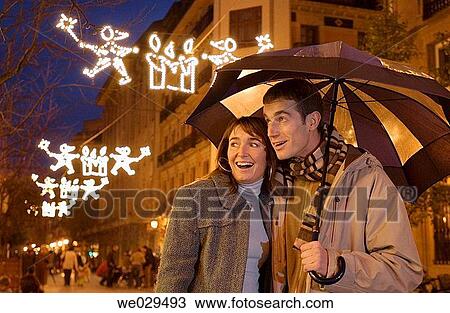 Couple shopping. Christmas decoration. San Sebastißn-Donostia. Guip·zcoa. Euskadi. Spain View Large Photo Image Stock Image - Couple shopping. Christmas decoration. San Sebastißn-Donostia. Guip·zcoa. Euskadi. Spain. Fotosearch