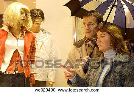 Couple shopping under an umbrella. San Sebastißn-Donostia. Guip·zcoa. Euskadi. Spain View Large Photo Image Stock Image - Couple shopping under an umbrella. San Sebastißn-Donostia. Guip·zcoa. Euskadi. Spain. Fotosearch