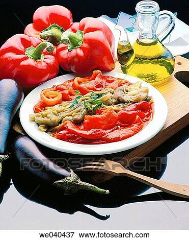 ? Escalivada? typical preparation of Catalan cuisine that consists of several types of grilled vegetables View Large Photo Image Stock Photo - ? Escalivada? typical preparation of Catalan cuisine that consists of several types of grilled vegetables. Fotosearch