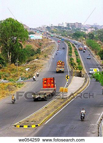 Far bipass road Mumbai-Banglore National Highway going towards Katraj Pune, Maharashtra, India View Large Photo Image Stock Photo - Far bipass road Mumbai-Banglore National Highway going towards Katraj Pune, Maharashtra, India. Fotosearch