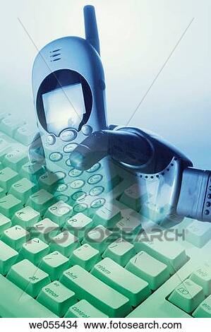Photo Composite of Computer Keyboard and Robotic Hand with Mobile Phone View Large Photo Image Picture - Photo Composite of Computer Keyboard and Robotic Hand with Mobile Phone. Fotosearch