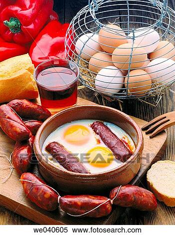 Poached eggs with pork sausage View Large Photo Image Stock Photography - Poached eggs with pork sausage. Fotosearch