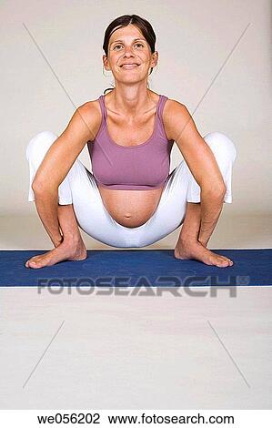 Pregnant Woman Doing Yoga View Large Photo Image Stock Image - Pregnant Woman Doing Yoga. Fotosearch