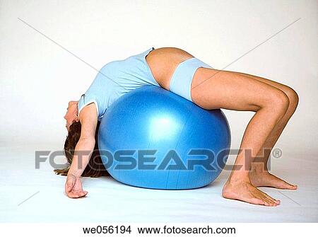 Pregnant Woman Exercises on a Ball View Large Photo Image Picture - Pregnant Woman Exercises on a Ball. Fotosearch
