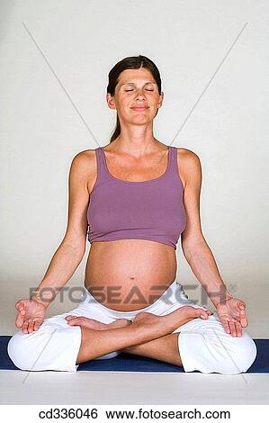 Pregnant Woman Practicing Yoga Postures View Large Photo Image Stock Photograph - Pregnant Woman Practicing Yoga Postures. Fotosearch