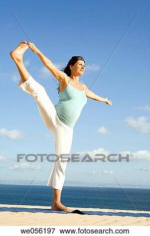 Pregnant Woman Practicing Yoga View Large Photo Image Stock Photo - Pregnant Woman Practicing Yoga. Fotosearch