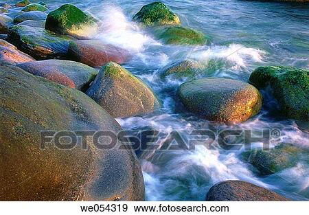 Stones washed around by the sea. R? gen island, Baltic Sea, Germany View Large Photo Image Stock Photo - Stones washed around by the sea. R? gen island, Baltic Sea, Germany. Fotosearch