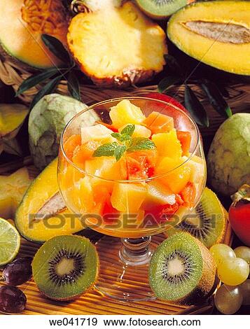 Stock Photo - Tropical fruits salad. Fotosearch