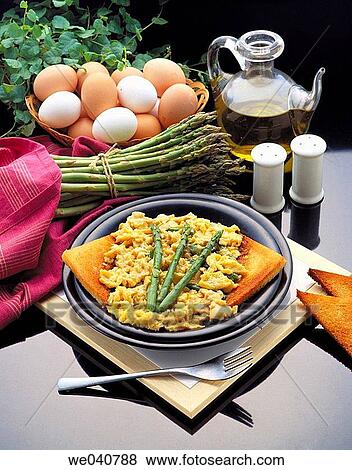 Wild asparagus in scrambled eggs View Large Photo Image Stock Photo - Wild asparagus in scrambled eggs. Fotosearch