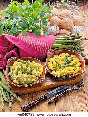 Wild asparagus in scrambled eggs View Large Photo Image Stock Photo - Wild asparagus in scrambled eggs. Fotosearch