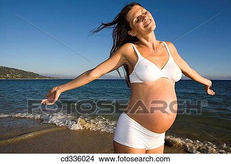 Woman Enjoying Her Pregnancy View Large Photo Image Picture - Woman Enjoying Her Pregnancy. Fotosearch