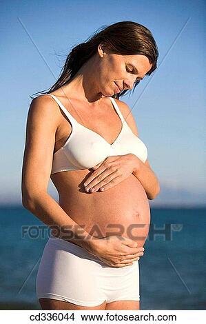 Woman Enjoying Her Pregnancy View Large Photo Image Picture - Woman Enjoying Her Pregnancy. Fotosearch