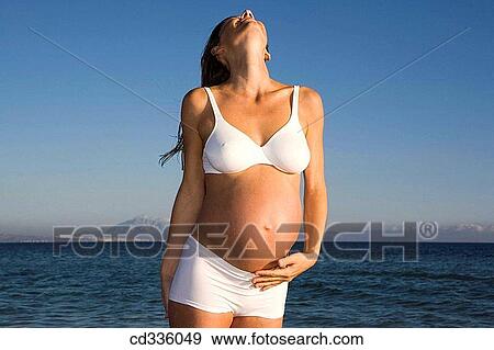 Woman Enjoying Her Pregnancy View Large Photo Image Stock Photo - Woman Enjoying Her Pregnancy. Fotosearch