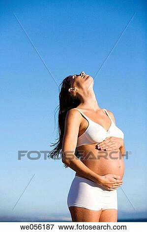 Woman Enjoying her Pregnancy View Large Photo Image Stock Photo - Woman Enjoying her Pregnancy. Fotosearch
