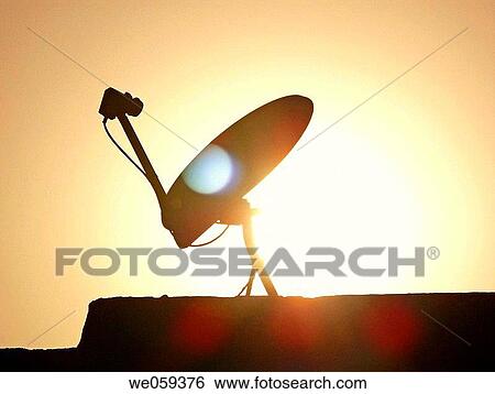 A dish antenna of a television set on a building terrace. Pune, Maharashtra, India. View Large Photo Image Stock Photograph - A dish antenna of a television set on a building terrace. Pune, Maharashtra, India.. Fotosearch