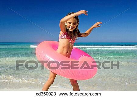 activity, beach, Arms raised, amusement, action View Large Photo Image Stock Image - activity, beach, Arms raised, amusement, action. Fotosearch