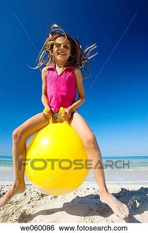 activity, beach, ball, amusement, action View Large Photo Image Stock Photograph - activity, beach, ball, amusement, action. Fotosearch