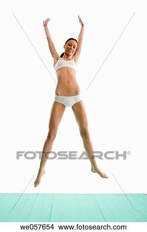 agile, brunette, Arms raised, agility, action View Large Photo Image Picture - agile, brunette, Arms raised, agility, action. Fotosearch