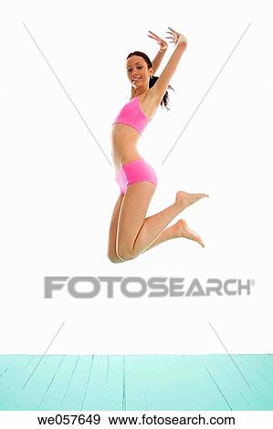 agile, brunette, Arms raised, agility, action View Large Photo Image Stock Photo - agile, brunette, Arms raised, agility, action. Fotosearch