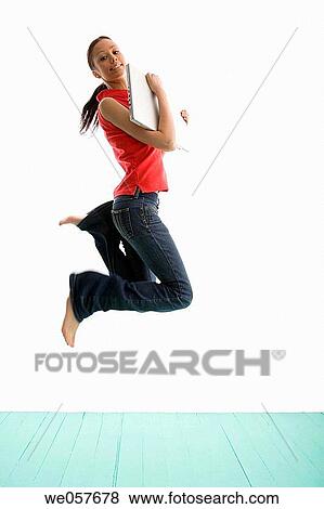 Stock Photo - agile, brunette, barefoot, agility, action. Fotosearch