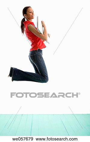 Stock Photo - agile, brunette, barefoot, agility, action. Fotosearch