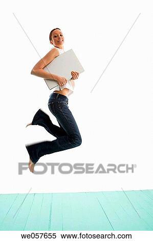 agile, carry, brunette, agility, action View Large Photo Image Stock Photography - agile, carry, brunette, agility, action. Fotosearch