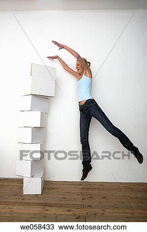 agility, blond, balance, Arms raised, agile View Large Photo Image Stock Image - agility, blond, balance, Arms raised, agile. Fotosearch