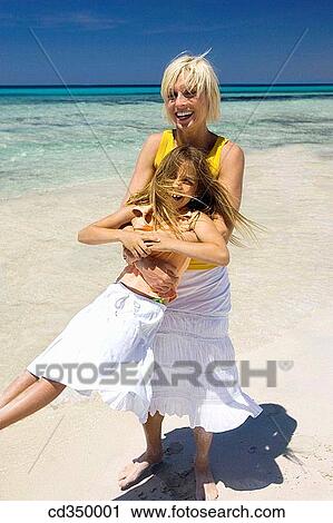 amusement, blond, beach, barefoot, action View Large Photo Image Stock Image - amusement, blond, beach, barefoot, action. Fotosearch