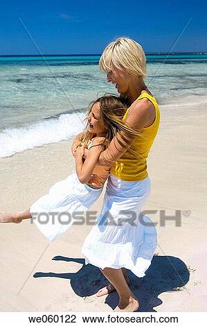 amusement, blond, beach, barefoot, action View Large Photo Image Stock Image - amusement, blond, beach, barefoot, action. Fotosearch